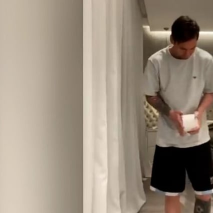 Barcelona’s Lionel Messi takes the ‘10-touch toilet paper challenge’ at his home. Photo: Instagram/@leomessi