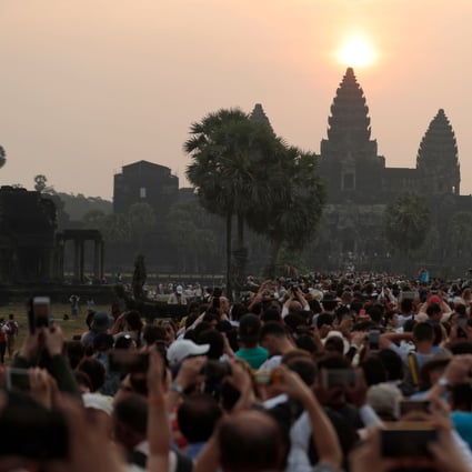 Angkor Wat in 2018. Today the crowds are gone, but they will return after the pandemic has passed. Photo: AFP via Getty Images