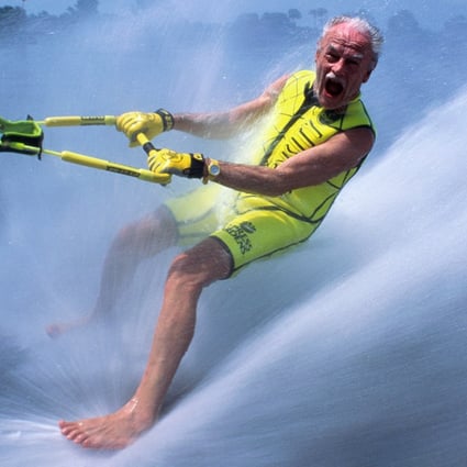 More seniors, like this elderly man water-skiing with bare feet, are among today’s adventurous and well-heeled silver-haired set. The wellness industry now wants to cash in on the elderly market. Photo: Getty Images