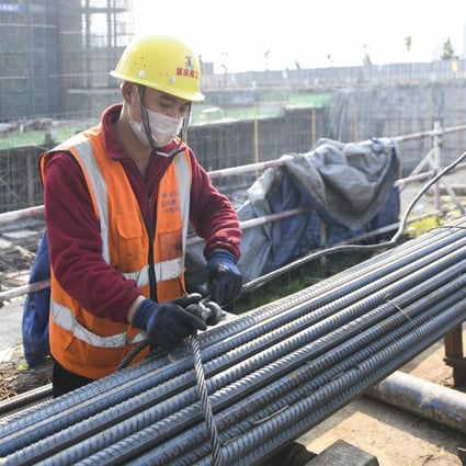 US-based research firm Axios wrote last week that if “Beijing responds with a large property and construction-heavy stimulus package, the resulting increase in cement and steel production could increase carbon intensity.” Photo: Xinhua