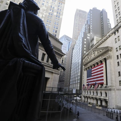 The New York Stock Exchange from the steps of Federal Hall on Wall Street. The Dow and S&P 500 indexes traded higher on Wednesday. Photo: Xinhua