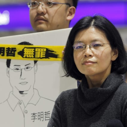 Lee Ching-yu, wife of Taiwanese activist Lee Ming-che jailed in China, answers questions during a press conference on March 28, 2019, as she arrives at Taoyuan International Airport. China banned her from visiting her husband in jail for three months, because of alleged improper behaviour. Photo: AP