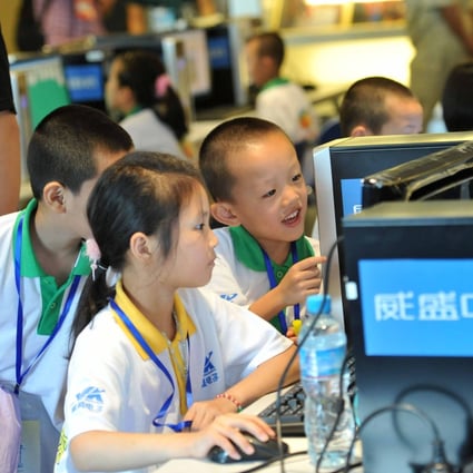 Chinese children attend a computer class in Beijing to learn how to properly use the internet. Those in poorer parts of the country lack sufficient access to the internet, as the switch to online teaching during the coronavirus outbreak in China showed. Photo: AFP
