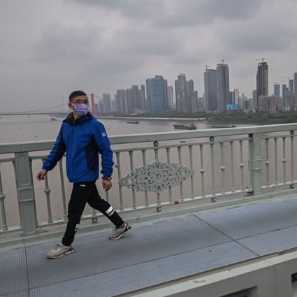 Residents of Wuhan have been advised to wear face masks and avoid crowded places when the city’s lockdown ends on April 8. Photo: AFP