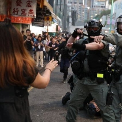 Police using pepper spray during an anti-government protest in Tuen Mun in November. Photo: Handout