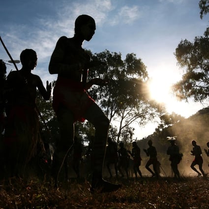 Aboriginal Australian dancers from the Yarrabah community. Yarrabah went into lockdown last week to prevent the coronavirus getting in. Photo: Getty Images