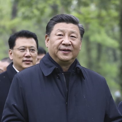 Xi Jinping and other senior officials pictured without masks during a tour of Zhejiang province. Photo: Xinhua