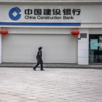A closed China Construction Bank branch in Wuhan. The lender says about 5 per cent of its small and medium-size business borrowers had requested an extension of loan repayments. Photo: EPA-EFE