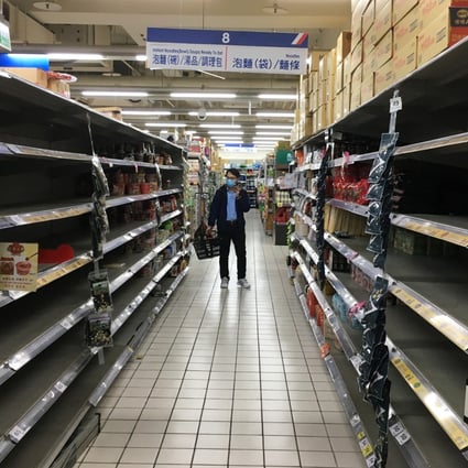 Empty shelves at a Carrefour supermarket in Taiwan following the coronavirus outbreak. Photo: Reuters