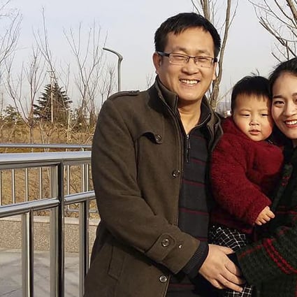 Wang Quanzhang (left) and his wife Li Wenzu with their son in 2015. Photo: AP