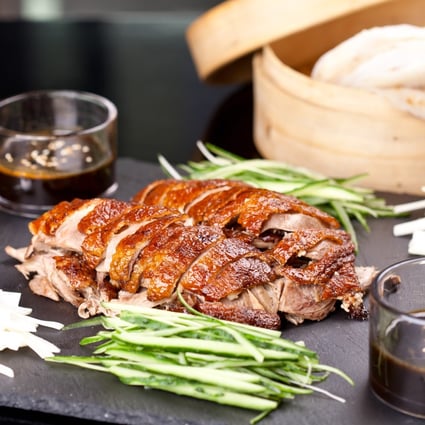 Find recipes from Guangzhou, Fujian, Beijing, Shanghai and Sichuan, including Peking duck, in Five Treasures of Chinese Cuisine, by Flora Chang and Gaynell Fuchs. Photo: Shutterstock