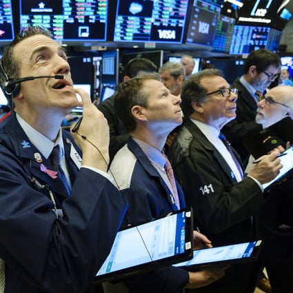 Floor traders at the New York Stock Exchange on 4 March 2020. Photo: EPA-EFE