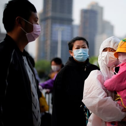 People move about in Wuhan, Hubei province, as travel restrictions are lifted in the original epicentre of the global coronavirus outbreak, on Wednesday. Photo: Reuters