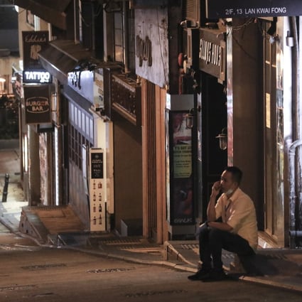 An empty street in the prime Hong Kong nightlife destination of Lan Kwai Fong in Central district. Hong Kong bar owners are enduring a two-week closure, but still need to pay rent and staff. Photo: Dickson Lee