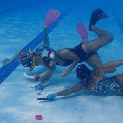 Indonesia's women's underwater hockey team train for the 2019 Southeast Asian Games. Photo: AFP