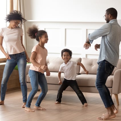 Dancing at home together as a family is one way to keep the coronavirus quarantine blues at bay. Photo: Shutterstock
