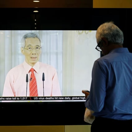 Singapore’s prime minister, Lee Hsien Loong, addresses the nation on the coronavirus in a telecast. Photo: Reuters