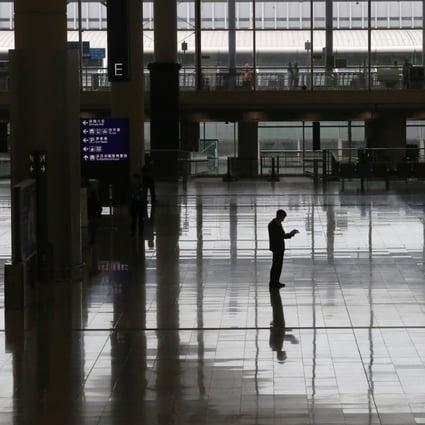 A lone figure at Hong Kong’s airport. Photo: Jonathan Wong