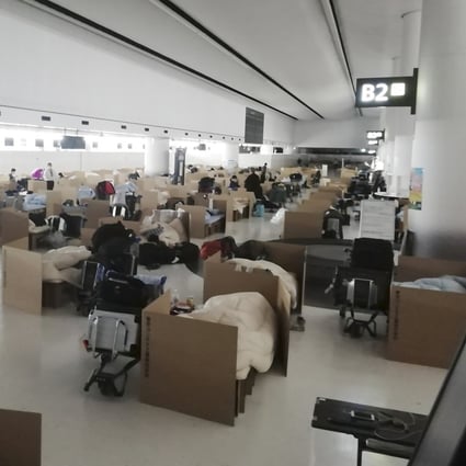 Cardboard beds at Narita airport near Tokyo set up for people who have to wait for the results of government coronavirus quarantine checks. Photo: AP
