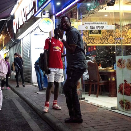 A street in the “Little Africa" district of Guangzhou, the city in southern China which is facing accusations of racial discrimination against its African community after five Nigerians tested positive for the new coronavirus. Photo: AFP
