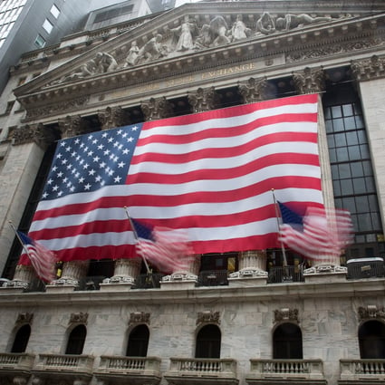 US national flags flutter outside the New York Stock Exchange. The US has the world’s largest stock market with a capitalisation of US$29 trillion. Photo: Xinhua