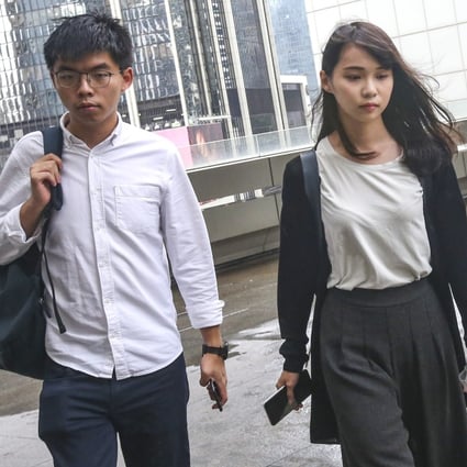 Police obtained warrants to search the phones of Joshua Wong and Agnes Chow. Photo: David Wong