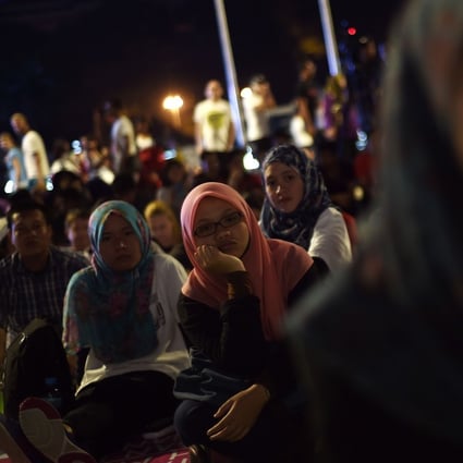 A live audience watch a cultural performance in Malaysia’s capital of Kuala Lumpur, in a time before coronavirus. Photo: AFP