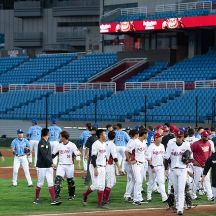 Players from the Fubon Guardians and Rakuten Monkeys disperse after a bench-clearing brawl during the first game of the season. Photo: Gene Wang/Getty Images