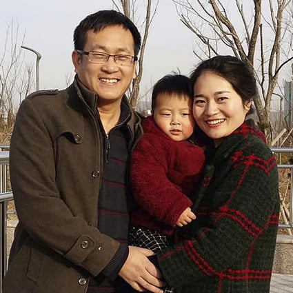 Wang Quanzhang and his wife, Li Wenzu, with their son in February 2015. He was arrested five months later and is now detained in Jinan, Shandong province, unable to join his family in Beijing. Photo: Wang Quanxiu via AP