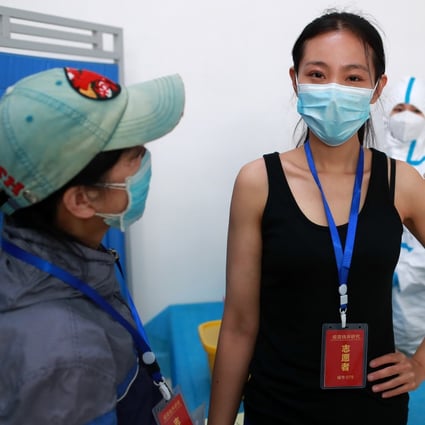 A medic in Wuhan, China injects a volunteer with a test vaccine as part of a clinical trial to battle the spread of coronavirus. Photo: DPA