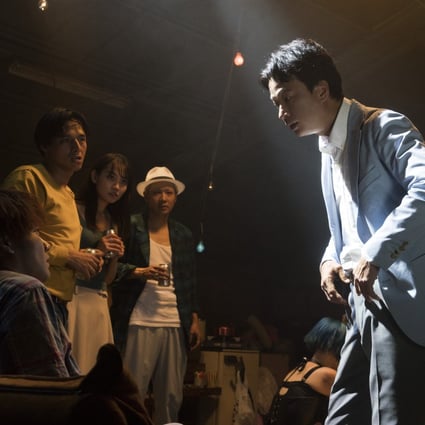 Kippei Shiina (right) plays a charismatic con artist in The Forest of Love, streaming on Netflix.