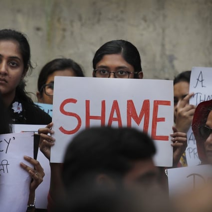Students hold banners and participate in a protest against India’s citizenship law and recent communal violence in New Delhi, India, Tuesday, March 3, 2020. (AP Photo/Manish Swarup)
