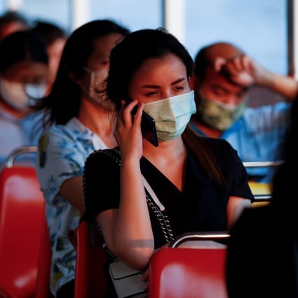Commuters on a boat seen in face masks in Bangkok on April 15, 2020. Photo: Reuters