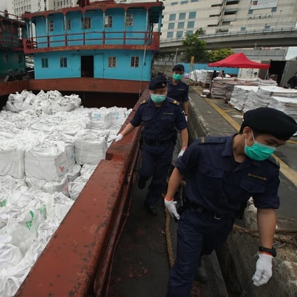 Smuggled frozen meat is displayed at the Public Cargo Working Area in Chai Wan, Hong Kong. Photo: Felix Wong
