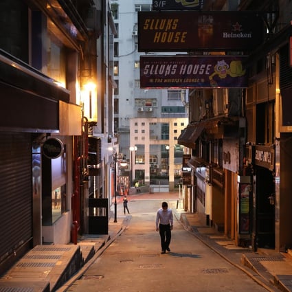 The normally busy nightlife area of Lan Kwai Fong in Central has been much quieter after bars and pubs were ordered to close by the government as part of its social-distancing measures. Photo: Winson Wong