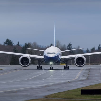 A Boeing 777X airliner taxis alongside the runway in preparation for its first flight on January 25, 2020, in Everett, Washington. Cathay Pacific has ordered 21 of the new long-haul jets, though sources say they are now considering deferring delivery or even switching to a less expensive plane. Photo: Getty Images