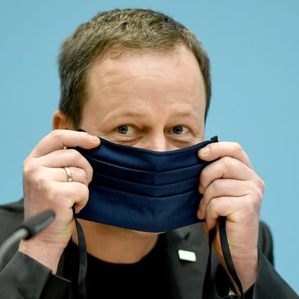 An article in Nature Medicine says the ACE2 expression in the nose could be higher than other parts of the respiratory system, making the nose a possible entry point for the coronavirus. Klaus Lederer, Senator for Culture and Europe of the State of Berlin, shows how to wear a mouth and nose protector. Photo: DPA