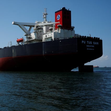 An oil tanker is seen off Jurong Island in Singapore. About 60 clean fuel tankers are currently anchored along the busy strait, with some being used to hoard fuel at sea and others parked as the Covid-19 outbreak affects the oil market. Photo: Reuters