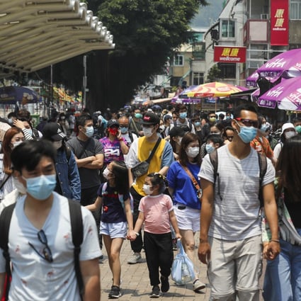 People wear masks as they visit Cheung Chau in Hong Kong at the weekend. Photo: Winson Wong