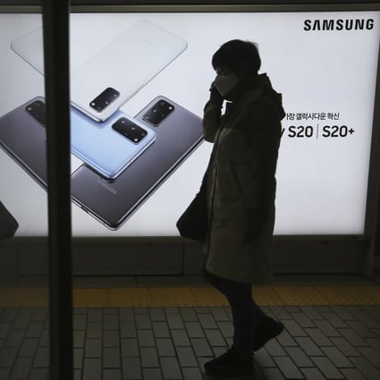 A man passes by an advertisement of Samsung Electronics' flagship Galaxy S20 and S20+ smartphones in Seoul, South Korea, on April 28. Photo: AP