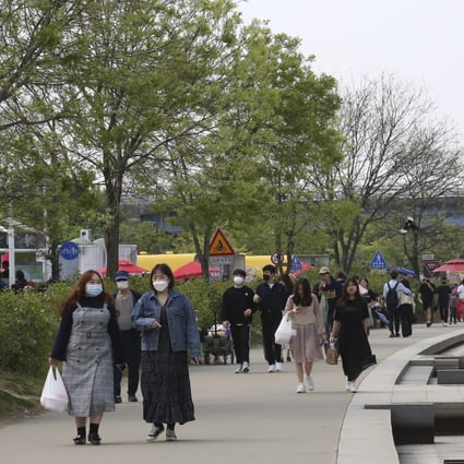 People visit a public park along the Han River in Seoul, South Korea, on April 30. Photo: AP