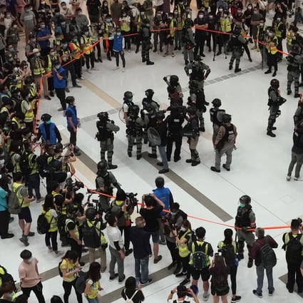Riot police cordon off the atrium of New Town Plaza in Sha Tin, Hong Kong, on Labour Day. Photo: Felix Wong