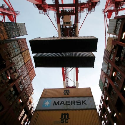 Containers are unloaded from a container ship at the Yangshan Deep Water Port in Shanghai, China, before the coronavirus pandemic brought things to a halt. Photo: Reuters