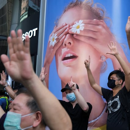 Anti-government protesters wearing face masks to avoid the spread of the coronavirus in Hong Kong on May 1, 2020. Photo: Reuters