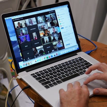 Ben Mulcahy, founder of Darlinghurst Life Drawing studio, organises a class for art students over a Zoom internet live stream in Sydney, Australia, on April 16. Zoom Video Communications has seen global usage of its service surge during coronavirus shutdowns. Photo: Reuters