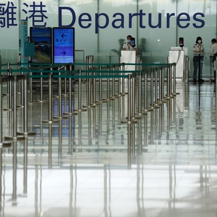 Hong Kong International Airport’s departure hall appears deserted amid the coronavirus pandemic. Photo: Sam Tsang