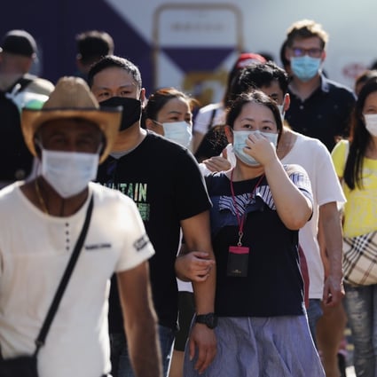 Hongkongers don surgical masks on the streets, amid the coronavirus pandemic. Photo: Winson Wong