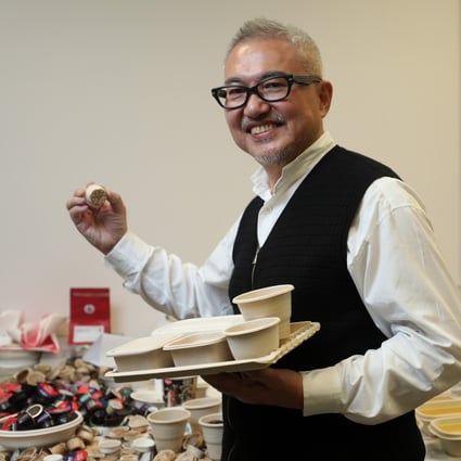 George Chen Dah-ren shows food packaging made from Ecoinno’s ‘green composite material’ at the company’s offices in Hong Kong Science & Technology Park. Photo: Xiaomei Chen