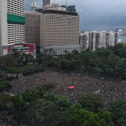 Protesters gather for a peaceful rally in Victoria Park on August 18, 2019. Photo: AFP