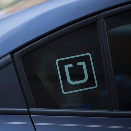 Uber is making face masks mandatory for drivers and passengers as part of new health and safety protocols aiming to instill confidence in the ride-hailing service as people emerge from coronavirus lockdowns. Photo: AFP